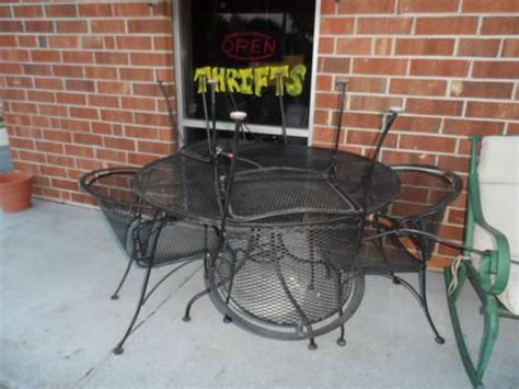 Addition of upholstered bench incorporates a generous helping of casually cool flair. Black Wrought Iron Patio Set Round Table & 4 Chairs for ...