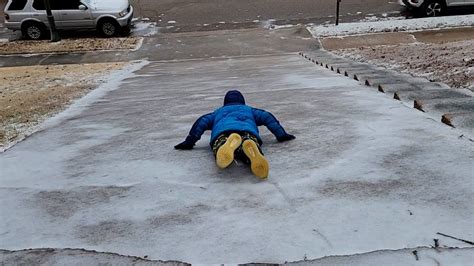 Mother Son Duo Enjoys Sliding Down Icy Driveway Good Morning America