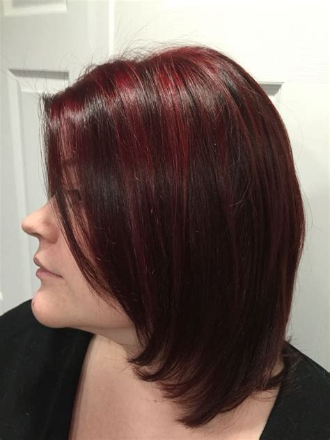 Long brown hair with layers. Long layered bob with cherry red highlights on natural ...