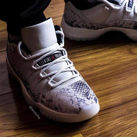 The upper is also built with leather instead of mesh, while the air midsole gives way to an icy translucent outsole. Air Jordan 11 Low Snakeskin Light Bone CD6846-002 ...