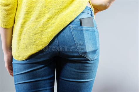 Mobile Phone In Jeans Pocket Stock Photo Image Of Cardigan Grey