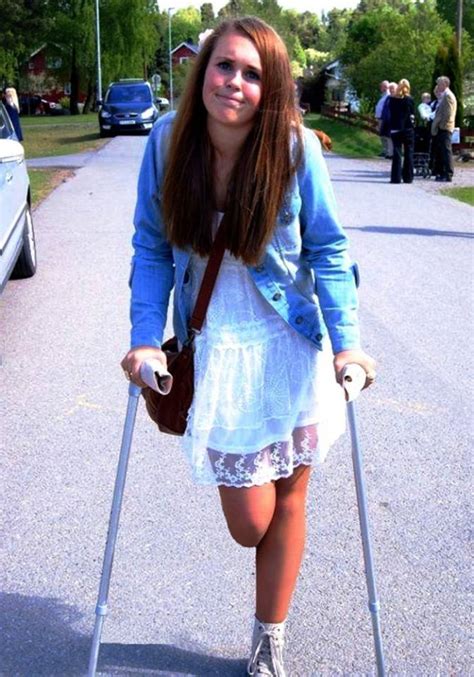 Dak Amputee Girl With Protheses On Crutches 453