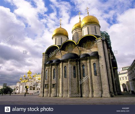 The Golden Domes Of A Russian Orthodox Church In The Kremlin On Red