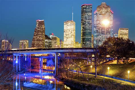 Downtown Houston City Skyline At Night On The Buffalo Bayou Photograph