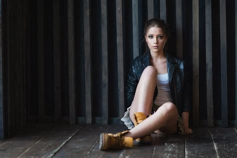 Woman With Black Leather Jacket Sitting Near Wall Hd Wallpaper