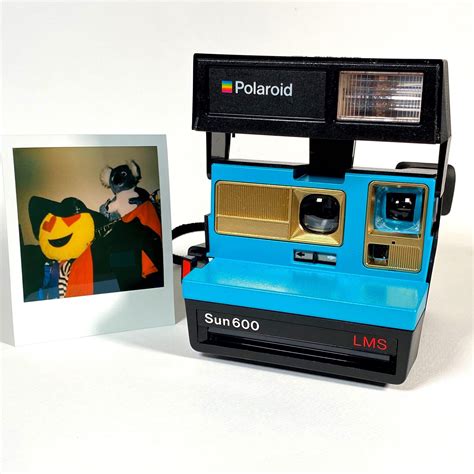 Polaroid Sun 600 With Upcycled Turquoise And Gold Face Refreshed