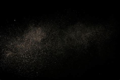 White Dust Particles On Black Background · Free Stock Photo