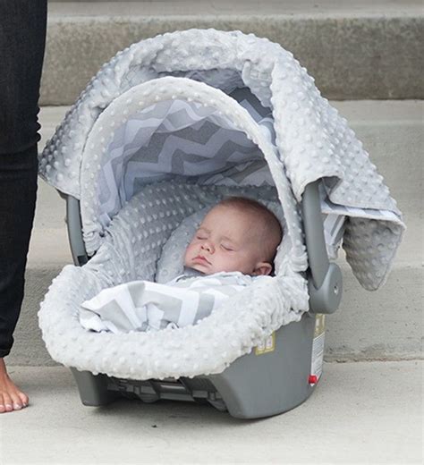 Car seat covers provide protection from the elements, filling in the spaces that a car seat canopy won't reach, but that's not their only benefit. THE WHOLE CABOODLE CARSEAT CANOPY BABY CAR SEAT COVER 5 PC ...
