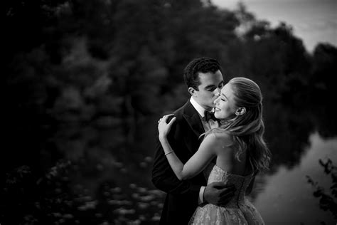 Romantic Groom Kisses Bride On Cheek Photo By Susan Stripling Photography