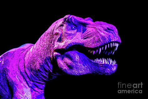 Colorful Pink And Purple Mean Looking Dinosaur With Long Sharp Teeth In