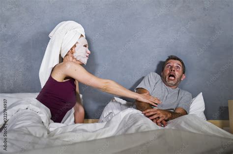 Funny Lifestyle Portrait Of Man And Woman Featuring Weird Married Couple With Wife In Head Towel