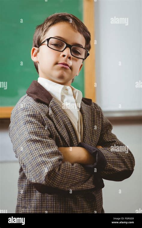 Pupil Dressed Up As Teacher With Arms Crossed Stock Photo Alamy