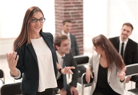 Business Woman While Asking Questions During Seminar Stock Photo