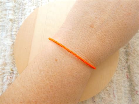 Orange Armband Samen Perle Armband Leuchtend Orange Armband Etsy