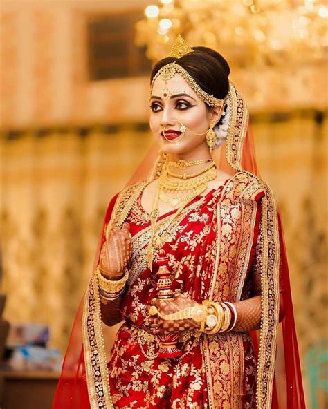 A Stunning Bengali Bride Indian Wedding Bride Bengali Bridal Makeup Bengali Bride