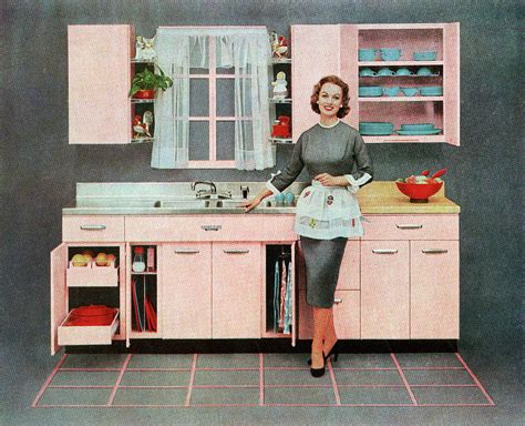 Housewife In Pink Kitchen Photograph By Graphicaartis