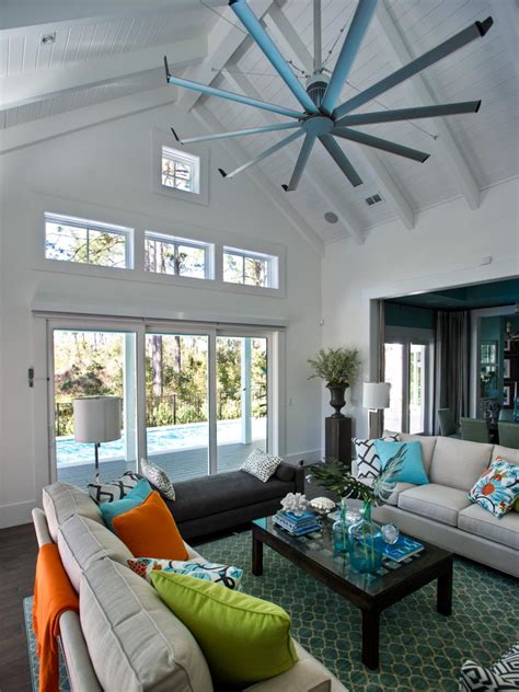 White Living Room With Soaring Ceilings And Coastal Decor