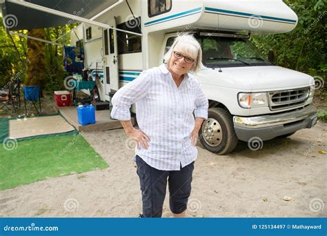 Happy Mature Woman With White Hair Camping With Rv Stock Image Image