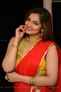 She made her film debut through kannada movie 'prema pallaki' in 2013. Telugu Heroine Ashwini in Red Saree - Exclusive Pictures