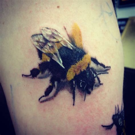 Cool Realistic Bumblebee Tattoo On Half Sleeve