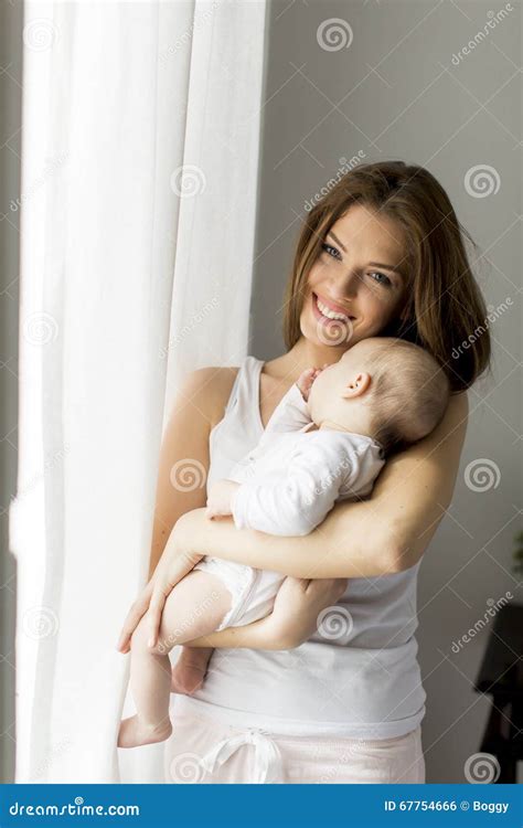 Happy Mother With Newborn Baby Girl Stock Photo Image Of Daughter