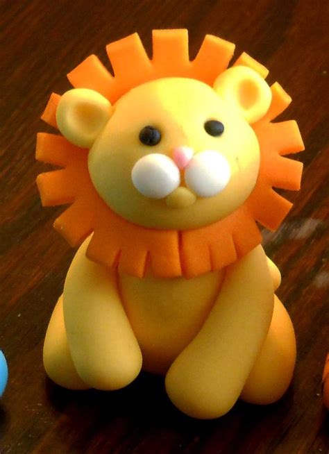 To avoid having to spend a birthday party cutting out slices of cake, you can also buy the food lion cupcake packs to provide individual servings to your guests. Cute Lion Cake Topper for birthday or baby shower fondant ...
