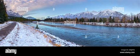 Wide Panoramic Landscape View Bow River And Snowy Mountain Peaks Of