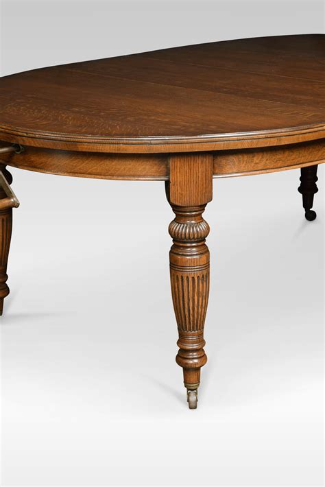 This table offers a split use where one end can be used as a desk, hidden from sight when dining the traditional way to extend a formal dining table is to insert extra 'leaves', or segments. Oak Oval Extending Dining Table - Antiques Atlas