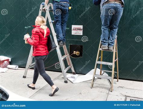 Two Handymen On Ladders Editorial Stock Image Image Of Handyman 85777539