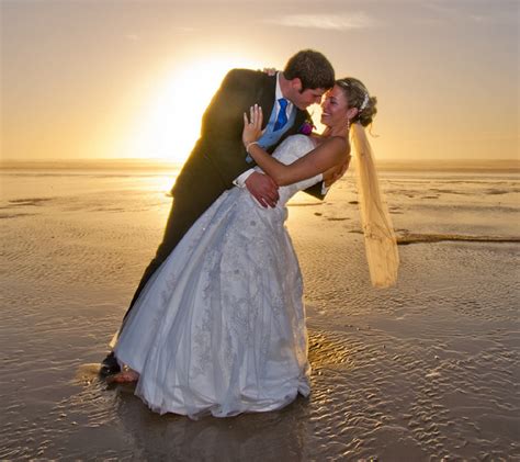 Stock Image of Newly Married Couple on Beach - Lensicle