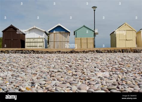 Colourful Wooden Beach Huts Along The Seafront At Budleigh Salterton Devon Stock Photo Alamy
