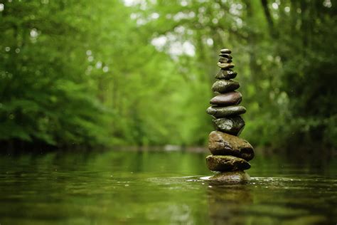 Stack Of River Stones In Placid Water Photograph By Colin Mcdonald Pixels