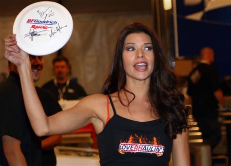Adrienne Janic Aj Holds Up An Autographed Frisbee Inside