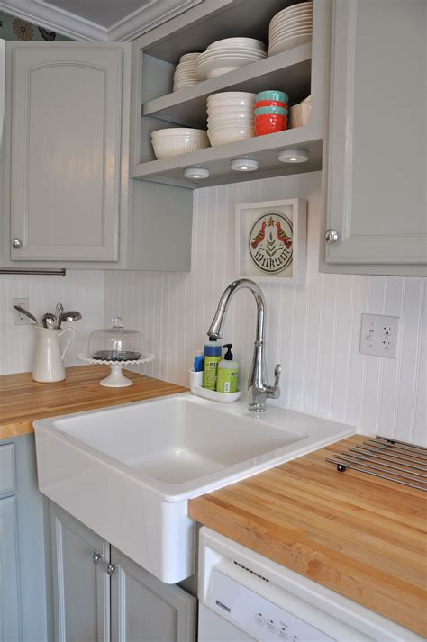 This article main ideas is adding beadboard to kitchen cabinets, antique beadboard, bead board cabinets, beadboard cabinets diy, beadboard in kitchen, beadboard wallpaper cabinets, beadboard wallpaper on cabinets, beadboard kitchen cabinet doors, beadboard in kitchens, how. White beadboard backsplash with my light grey cabinets and ...