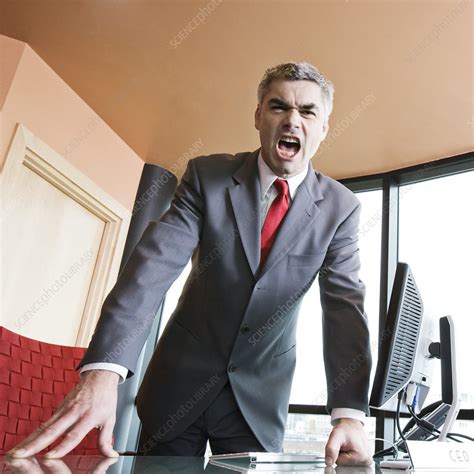 Angry Businessman Yelling At The Viewer Of The Photograph Stock Image