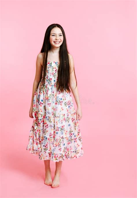 Portrait Of Adorable Smiling Little Girl Child In Dress Isolated Stock