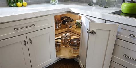 A blind corner kitchen cabinet near the stove can actually play in your favor. Lazy Susan Cabinet - Rotating Tray Storage | CliqStudios