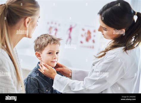 Little Boy Having Medical Examination By Pediatrician Stock Photo Alamy