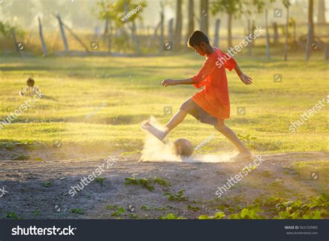 Asian Poor Kids Playing Football Field Stock Photo 563103985 Shutterstock