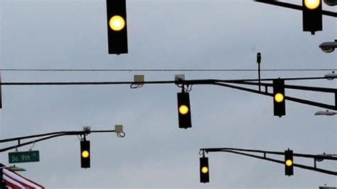 A Flashing Red Light At An Intersection Means That You Must