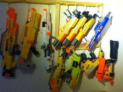 This diy nerf gun pegboard wall provides great storage and organization for nerf guns and nerf gun accessories. Outback Nerf: Blaster Rack