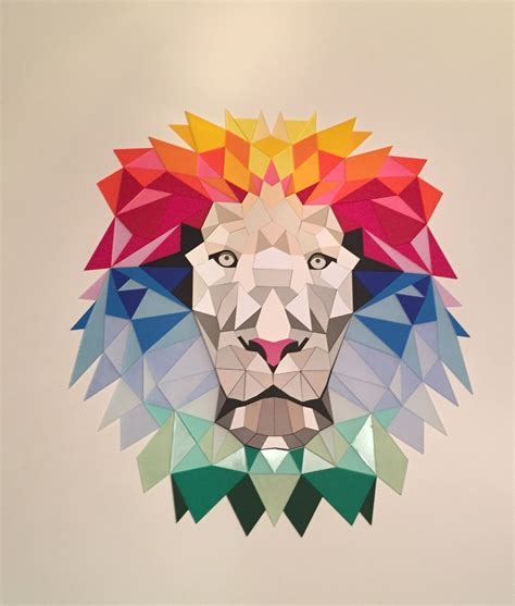 A Lion Made Out Of Geometric Paper On A Wall With The Colors Of The Rainbow