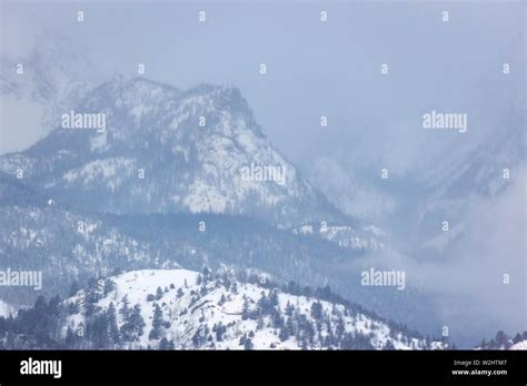 Snow Storm Rolling Over Mountain Peaks In Rocky Mountain National Park