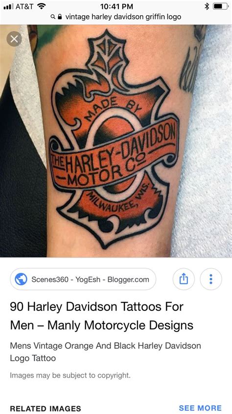 A Tattoo On Someones Arm With The Words Harley Davidson And An Orange