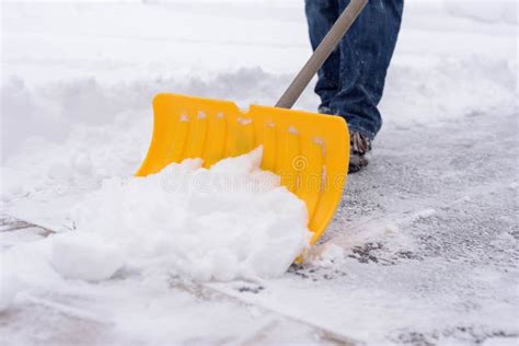 Closeup Of Man Shoveling Snow From Driveway Stock Image Image Of