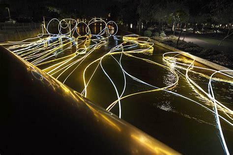 Golden Water Installation Dazzles Onlookers With Mesmerizing Led Lights