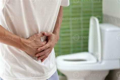 Constipation And Diarrhea In Bathroom Hurt Man Touch Belly Stomach