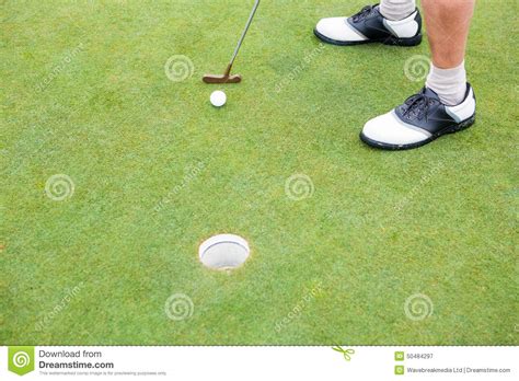 Golfer On The Putting Green At The Hole Stock Image Image Of Time