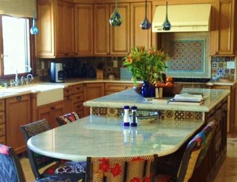 A kitchen island is a really useful addition to a kitchen and might be used for any number of activities for the part of the island that serves the seating area there are three generally accepted height options which are (smallest to tallest) table height, countertop height, bar height. Bi-level island, table height, and counter height, with ...