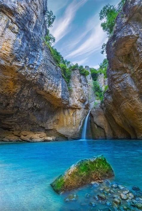 Beautiful Turquoise Water Fed By A Lovely Waterfall In This Amazing